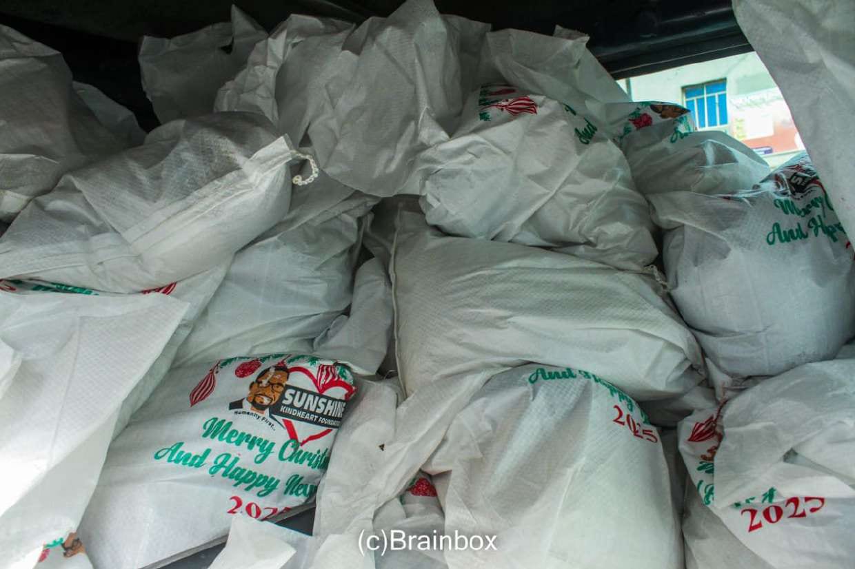 Branded food bags printed Merry Christmas 2025 stacked for distribution