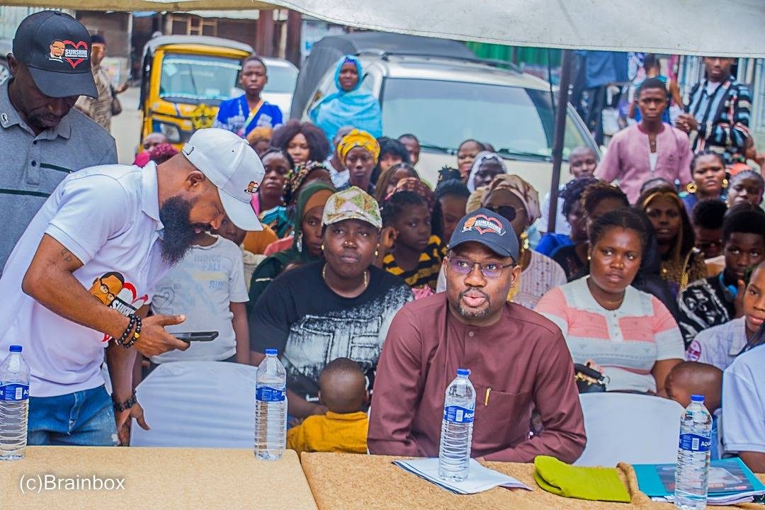 Dr. Arogundade Samsondeen with community members at an outreach